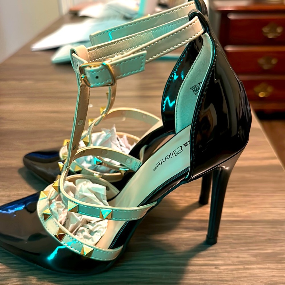 Brand new black/beige gold studs 4 inch heels.  Casual or dressy shoes.